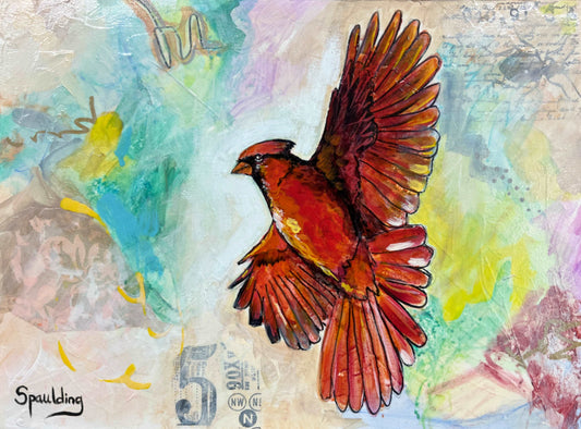  A vivid cardinal in mid-flight, with wings spread, against a soft, mixed-media backdrop.