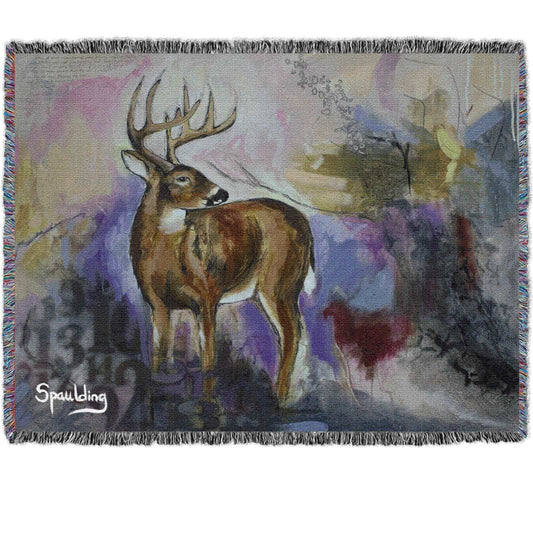 Whitetail deer with antlers, muted pinks, yellows, reds color scheme woven throw blanket: Nature-inspired comfort for wildlife enthusiasts.