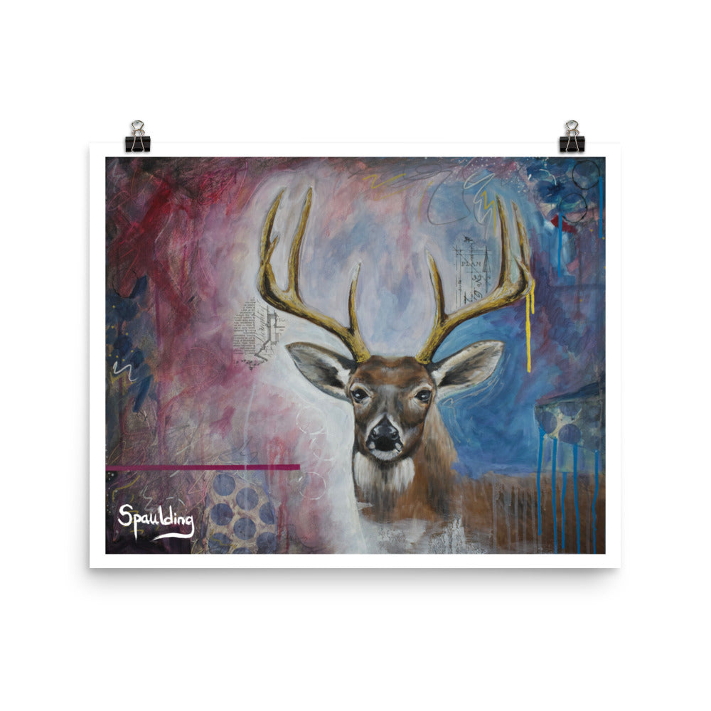 Paper art print of a whitetail deer with antlers with a background of light blues, darker blues and deep reds.