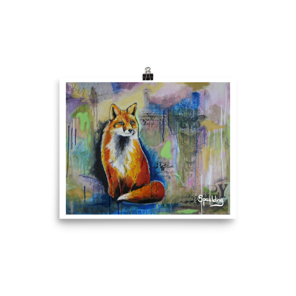 Paper print of a red fox sitting down with bushy tail with a background of blues, muted purples, pinks and green.