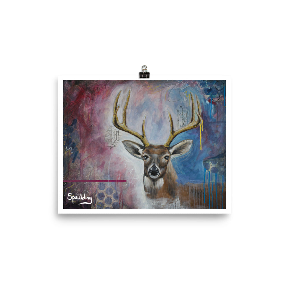 Paper art print of a whitetail deer with antlers with a background of light blues, darker blues and deep reds.