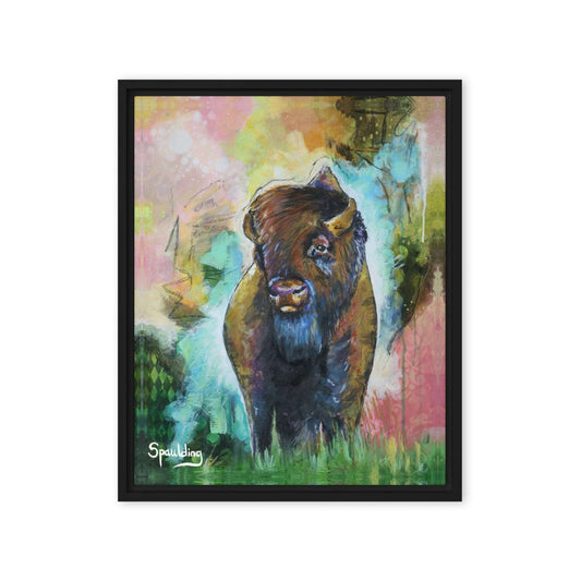 Framed canvas print with a bison standing in grass with a pink, yellow, green, teal color scheme background.