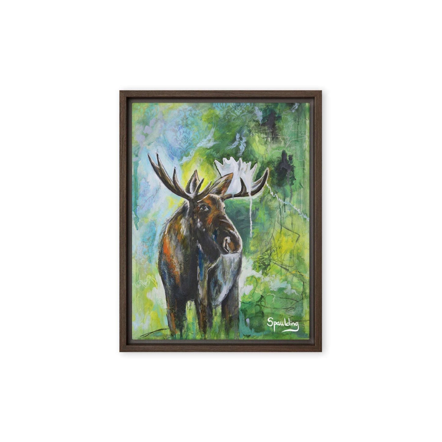 Framed canvas print of a bull moose with antlers standing in front of a green, blue and black background.