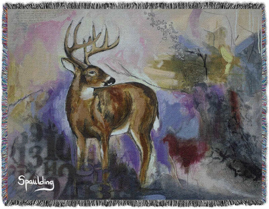 Whitetail deer with antlers, muted pinks, yellows, reds color scheme woven throw blanket: Nature-inspired comfort for wildlife enthusiasts.