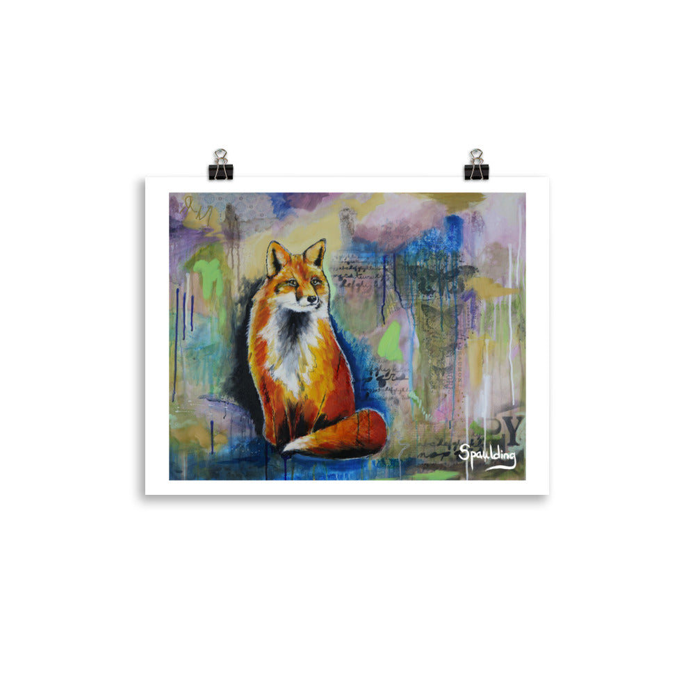 Paper print of a red fox sitting down with bushy tail with a background of blues, muted purples, pinks and green.