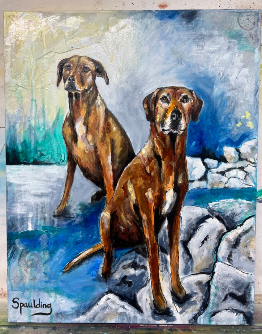 Painting of two brown dogs, one seated in the foreground on rocks, the other standing slightly behind. The background features abstract blues and greens, evoking a serene outdoor setting.